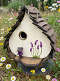 Lilac Dome birdhouse among wildflowers